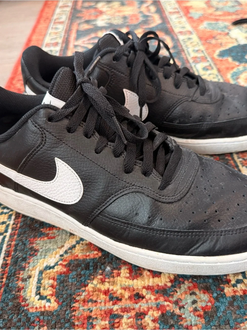 Nike Black Leather Low-Top Sneakers with White Swoosh